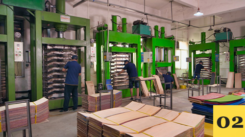 Maple veneers drying on racks inside the factory